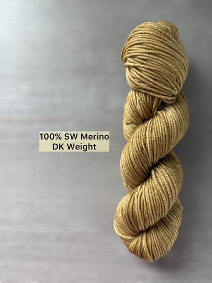 Ethically sourced "Adirondack Chair" hand-dyed golden merino wool yarn, DK weight.