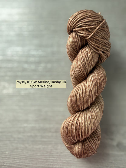 Hand-dyed "Lake House" ethically sourced merino wool yarn, soft browns, sport weight.