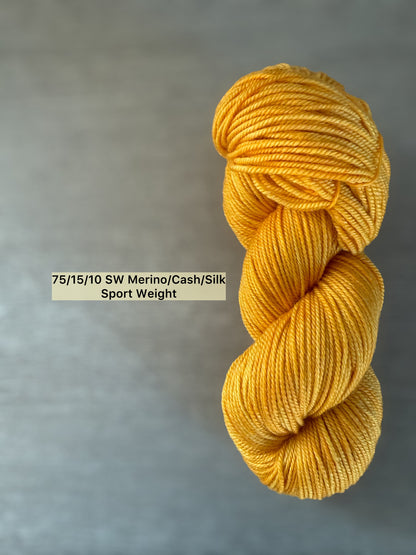 Soleil bright golden yellow hand-dyed sport weight yarn, ethically sourced merino/cashmere/silk blend.